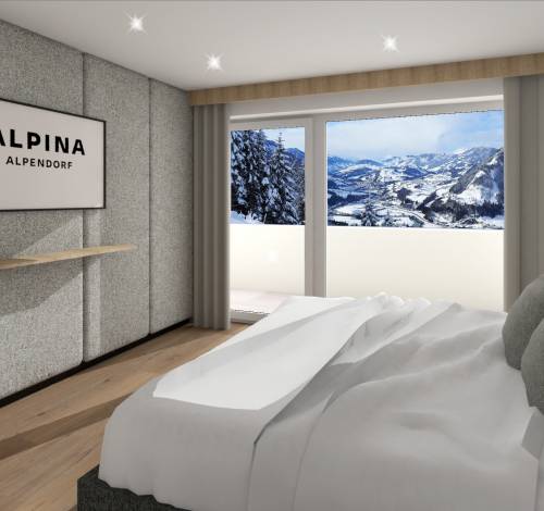 Die neu renovierten Schlafzimmer im Alpina Alpendorf mit Doppelbett.